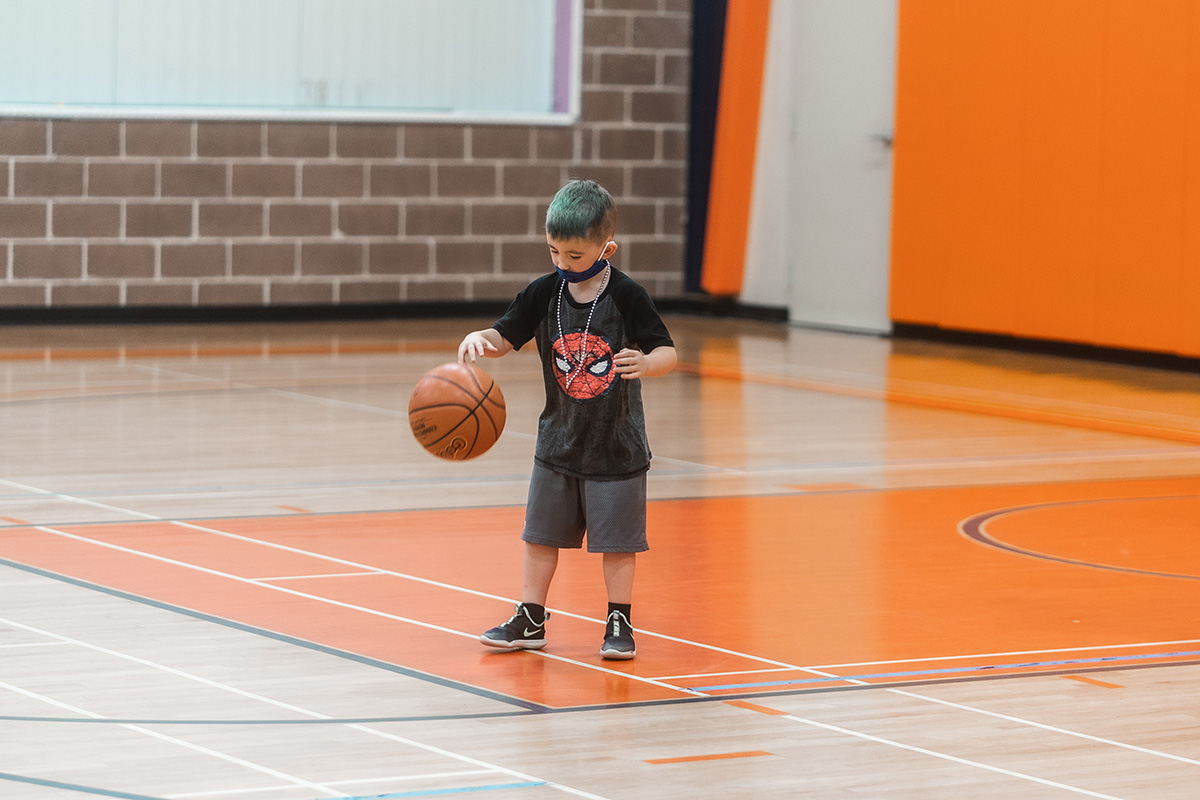 kid with basketball
